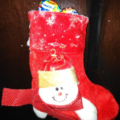 Gabriel's Christmas sock is full of candy.jpeg