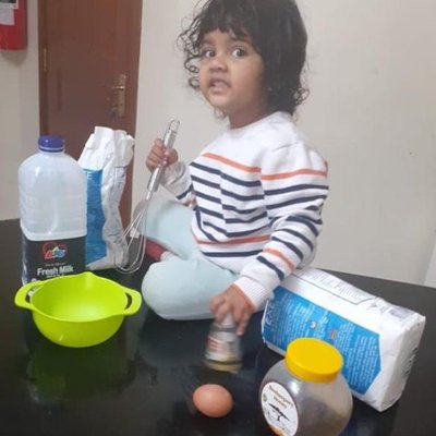 sanvi pancake making.jpg